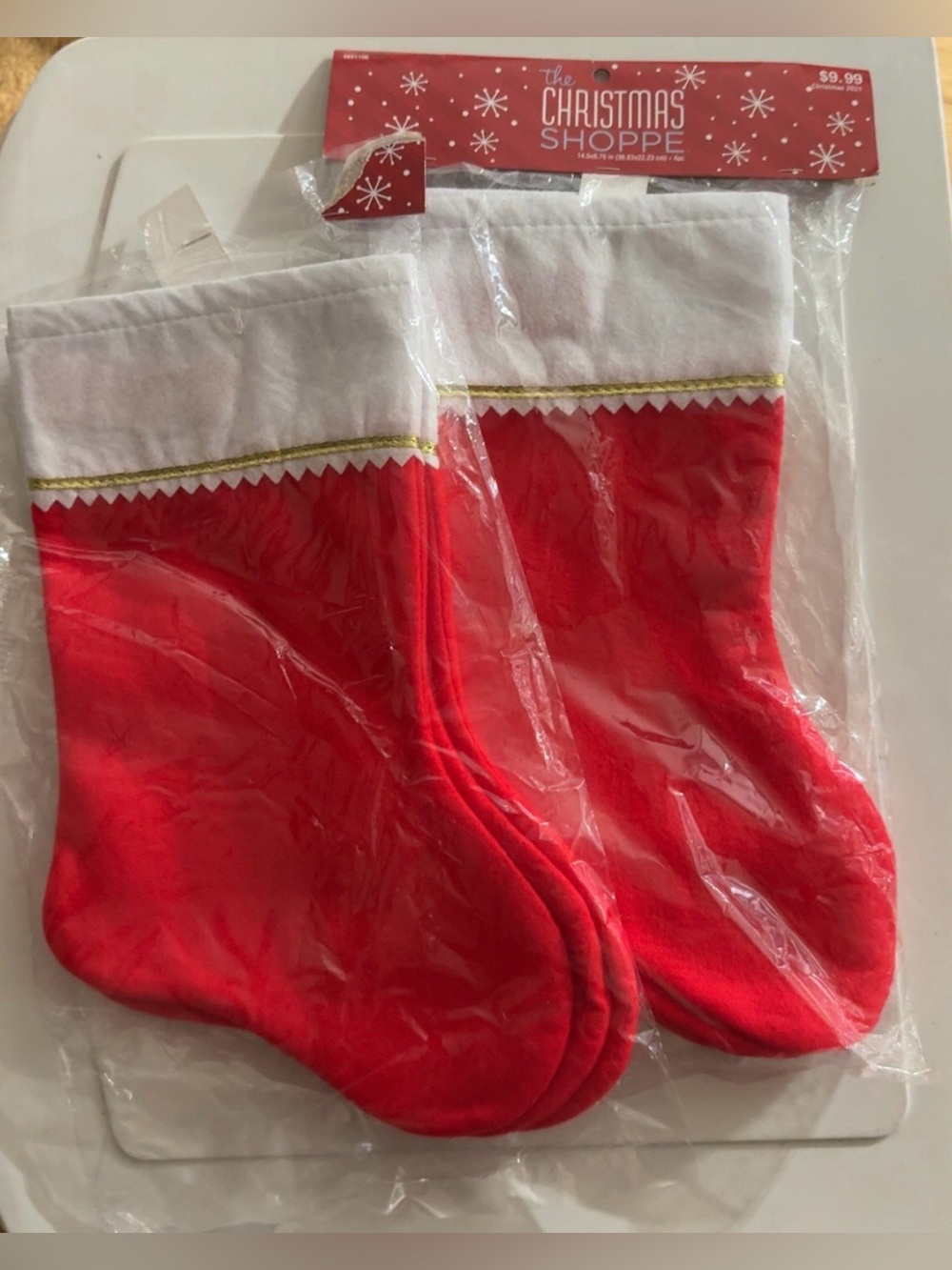 Set of 7 total Christmas stockings 1 unopened  (4) plus 1 opened package (3)